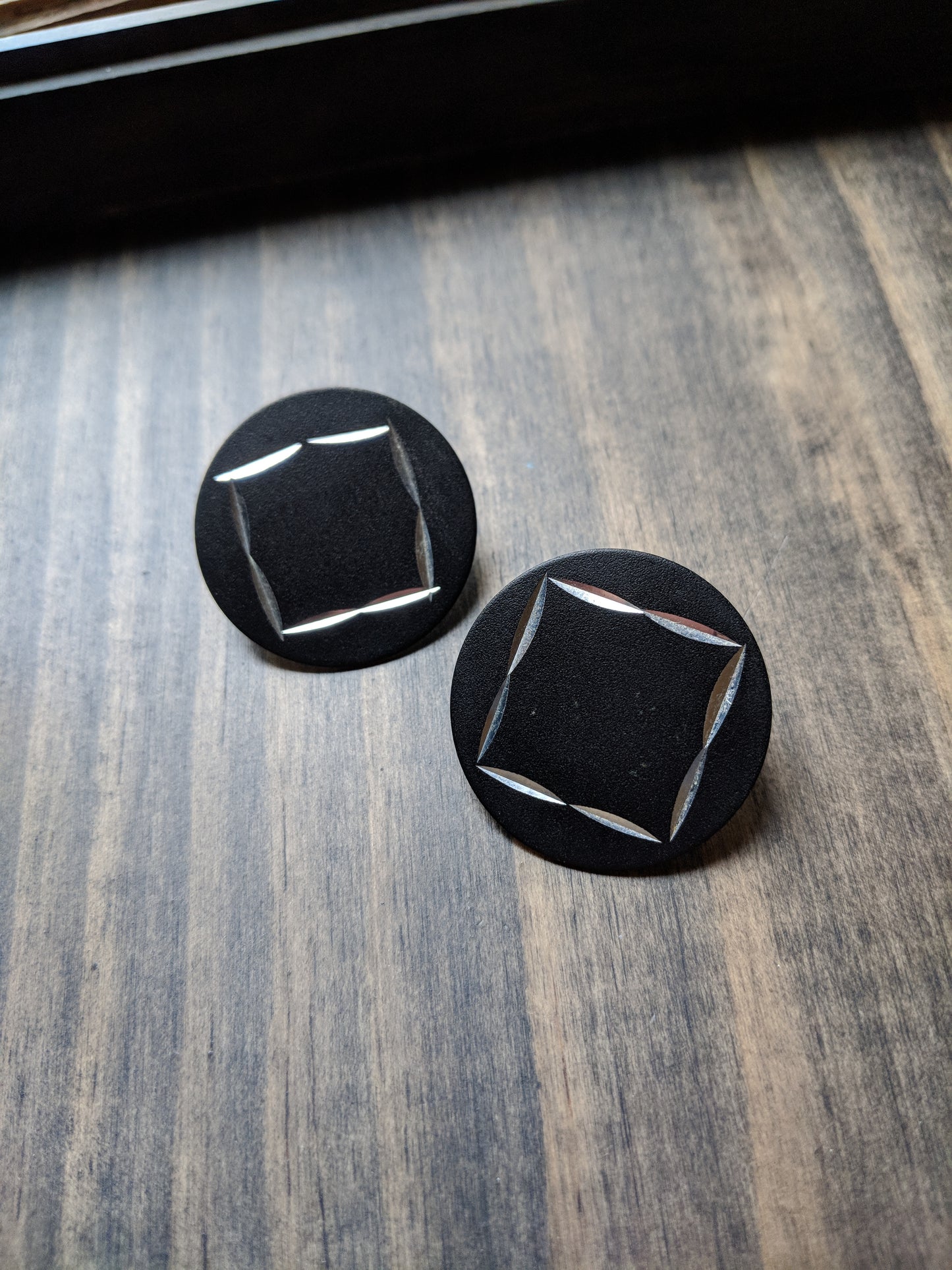 Round Black Silver Cut Earrings